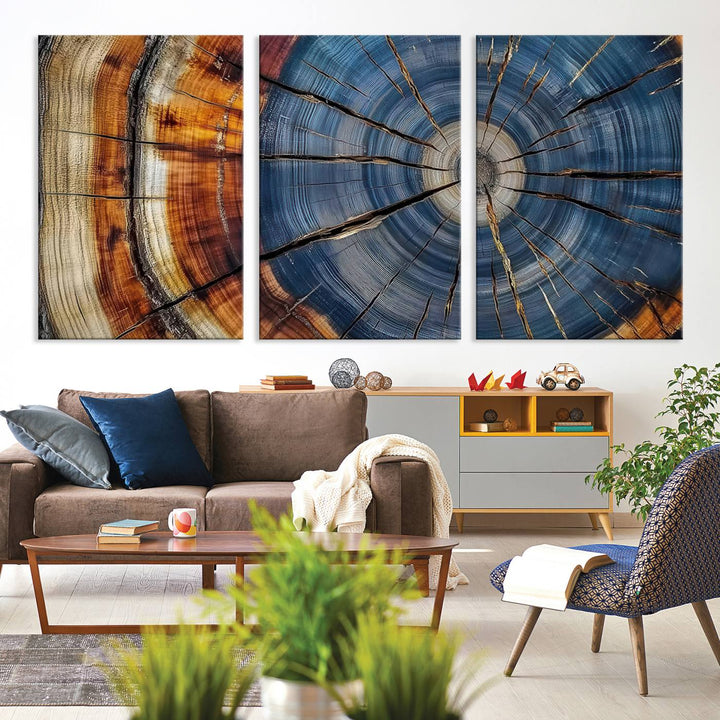 Close-up of blue, brown, and orange wood grain rings on the Abstract Tree Rings Canvas Wall Art Print.