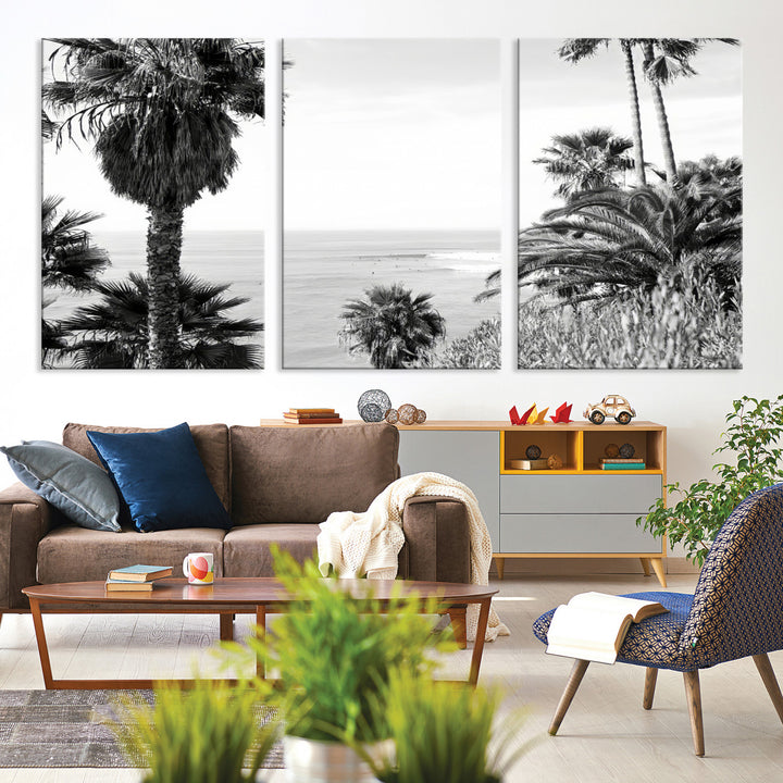 Monochrome canvas of palm trees framing a coastal surf scene, perfect for California-inspired or retro black-and-white beach decor.