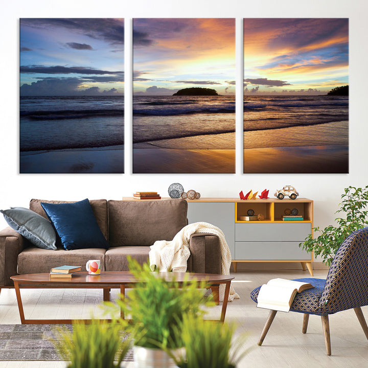 A tropical beach at sunset with waves gently washing ashore, reflecting golden and purple hues in the sky, creating a tranquil coastal scene.