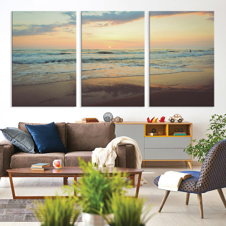 Warm sunset over gentle ocean waves with pastel sky and reflections on wet sand, creating a calm and soothing beach ambiance.