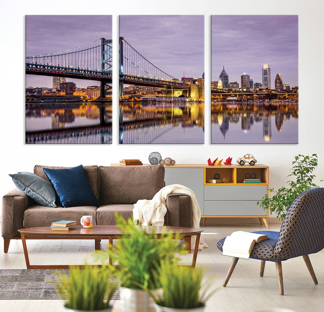 A woman holds the Philadelphia Ben Franklin Bridge Wall Art Canvas Print, a gallery-quality photo showcasing a city skyline with the bridge reflecting on the river. This stunning piece would make an excellent addition as premium canvas wall art for any home.