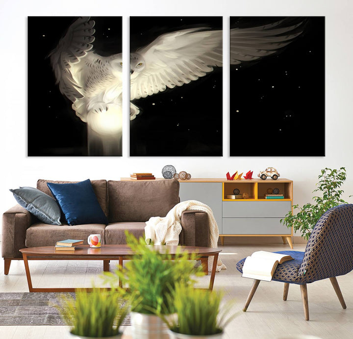 The Night Owl Art graces the wall with its depiction of a snowy owl on a glowing orb, perfect for modern decor.