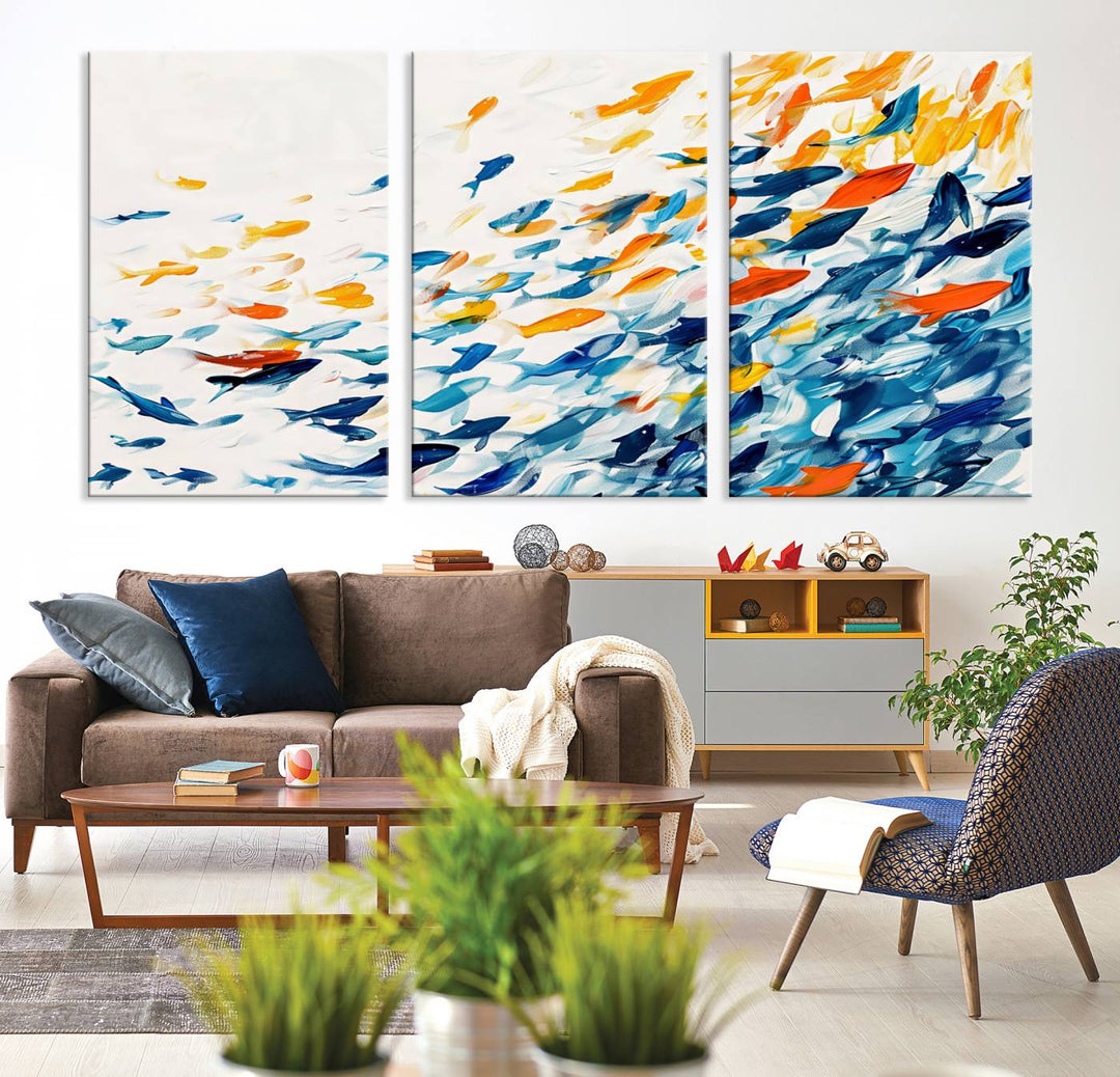 A colorful Abstract Fish Shoal Canvas Print hangs on the wall.