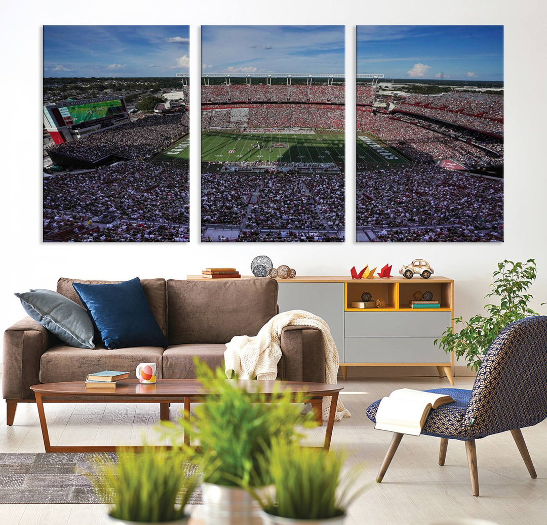 The wall art is a South Carolina Gamecocks print, showcasing Williams-Brice Stadium from a distance under clear skies.