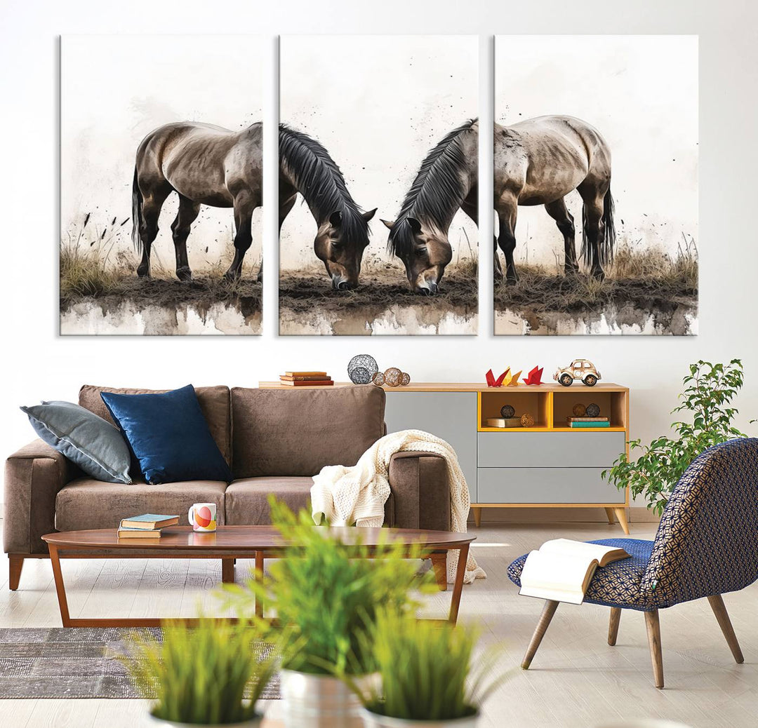 A Chinese Ink Style Horses Wall Art Canvas Print featuring two horses grazing is displayed in a modern setting.