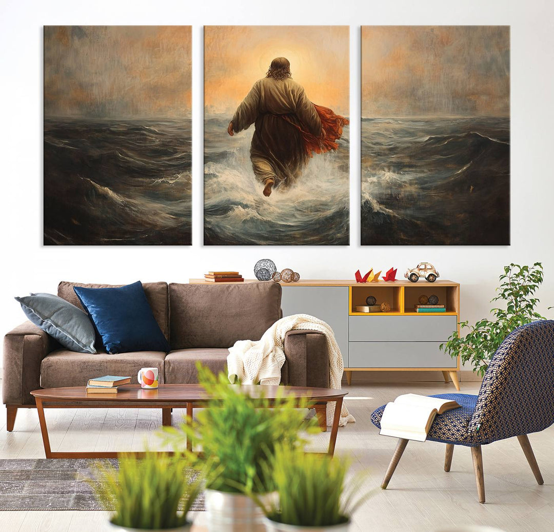 A modern living room is adorned with a triptych titled "Jesus Walking on Water, Christian Wall Art, Jesus Christ Walking on Oil Painting Style Print." The artwork, presented on museum-quality canvas, showcases vibrant colors and exquisite detail.