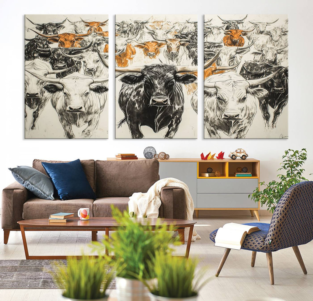 This exquisite farmhouse wall art, titled "Western Longhorn Cattle Canvas Print," showcases a majestic herd of longhorn cattle in a three-panel design. This ready-to-hang and framed barn decor infuses your space with rustic charm.