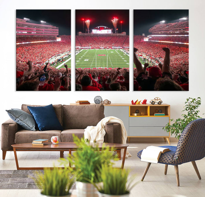 The University of Nebraska Cornhuskers Football Team Print, a vibrant three-panel canvas depicting Lincoln Memorial Stadium filled with enthusiastic fans from the end zone perspective, features a gallery-quality finish.