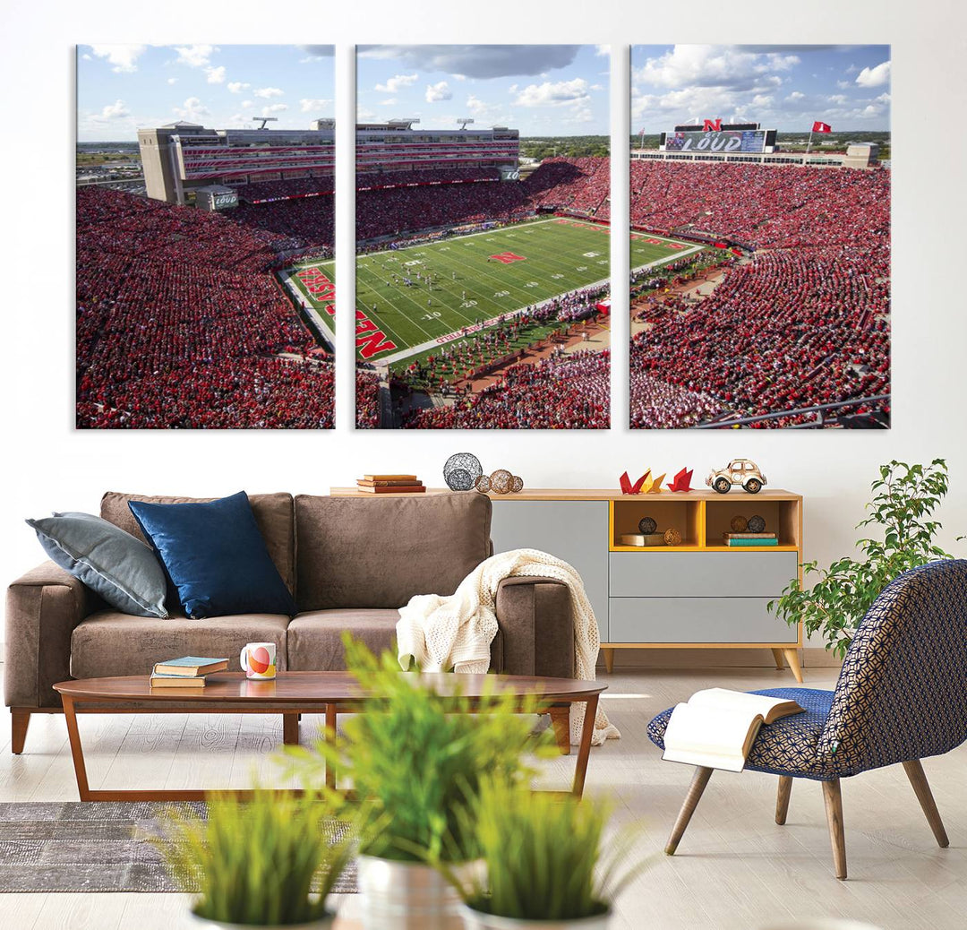 The University of Nebraska Cornhuskers Football Team Print showcases a vibrant triptych of Lincoln Memorial Stadium, depicting a packed football stadium filled with energetic fans. This handmade art piece is crafted in the USA and printed on premium canvas for a gallery-quality finish.