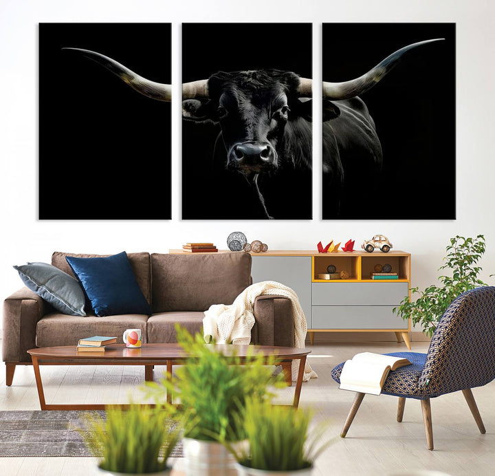 The Texas Black Longhorn Bull Canvas Print, featuring large curved horns set against a dark background, is ideal for Western decor.