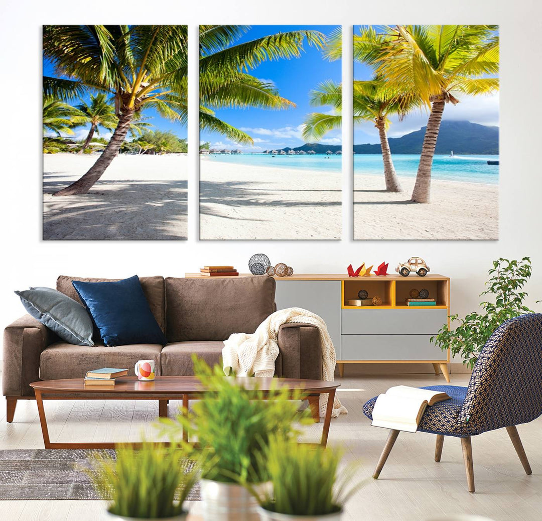 Blue Beach and Sea Wall Art Canvas Print: showcases a tropical scene with palm trees, white sand, and turquoise water.