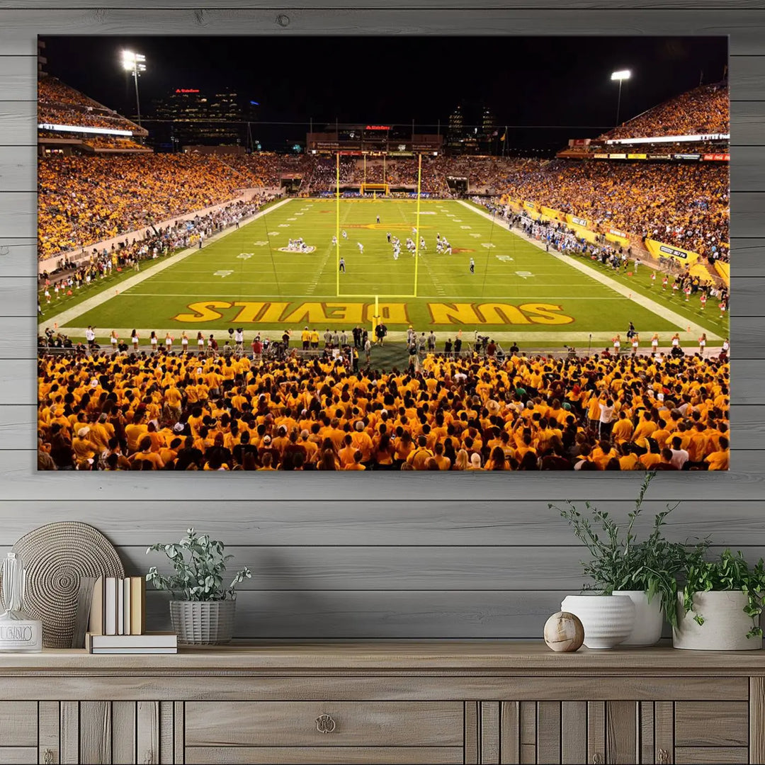 A living room boasts a gallery-quality finish with a large triptych featuring the ASU Sun Devils Football Team Print at Phoenix Mountain America Stadium wall art.