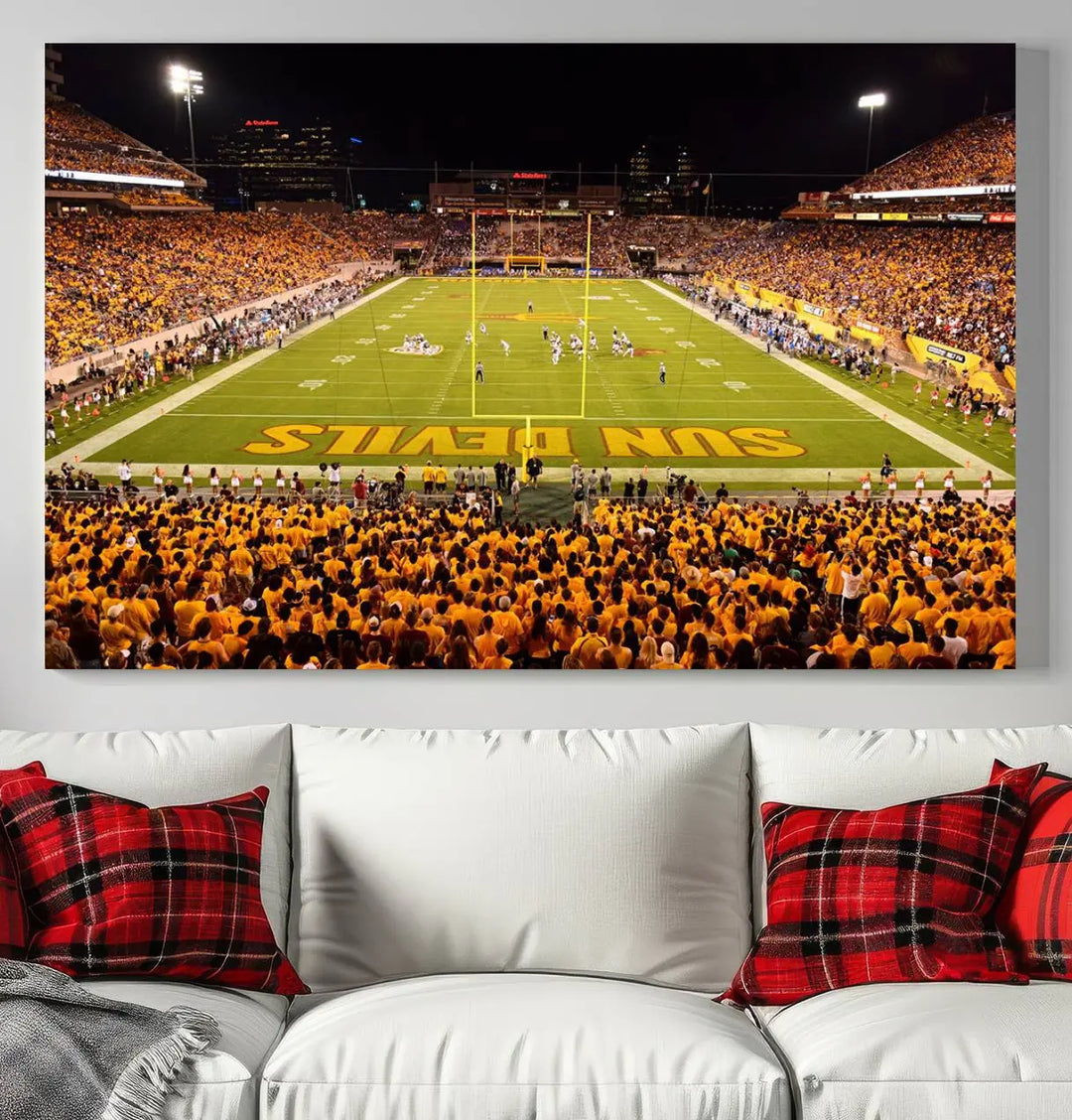 A living room boasts a gallery-quality finish with a large triptych featuring the ASU Sun Devils Football Team Print at Phoenix Mountain America Stadium wall art.