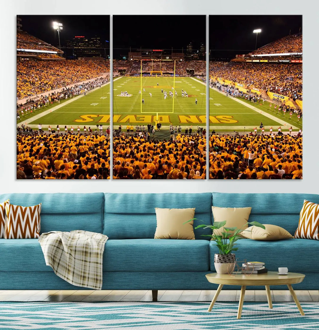 A living room boasts a gallery-quality finish with a large triptych featuring the ASU Sun Devils Football Team Print at Phoenix Mountain America Stadium wall art.