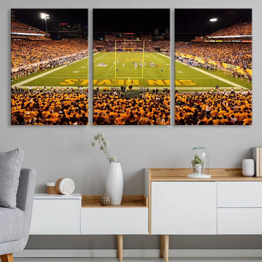 A living room boasts a gallery-quality finish with a large triptych featuring the ASU Sun Devils Football Team Print at Phoenix Mountain America Stadium wall art.