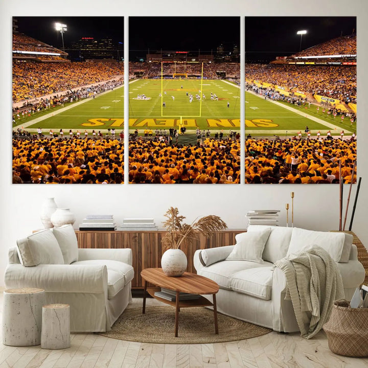 A living room boasts a gallery-quality finish with a large triptych featuring the ASU Sun Devils Football Team Print at Phoenix Mountain America Stadium wall art.