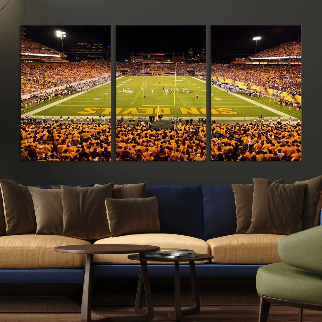 A living room boasts a gallery-quality finish with a large triptych featuring the ASU Sun Devils Football Team Print at Phoenix Mountain America Stadium wall art.