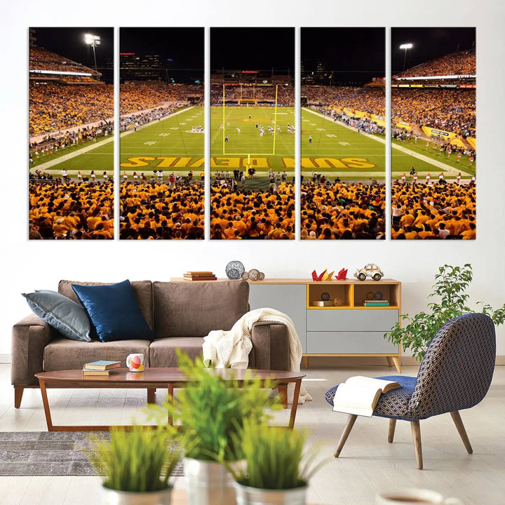 A living room boasts a gallery-quality finish with a large triptych featuring the ASU Sun Devils Football Team Print at Phoenix Mountain America Stadium wall art.