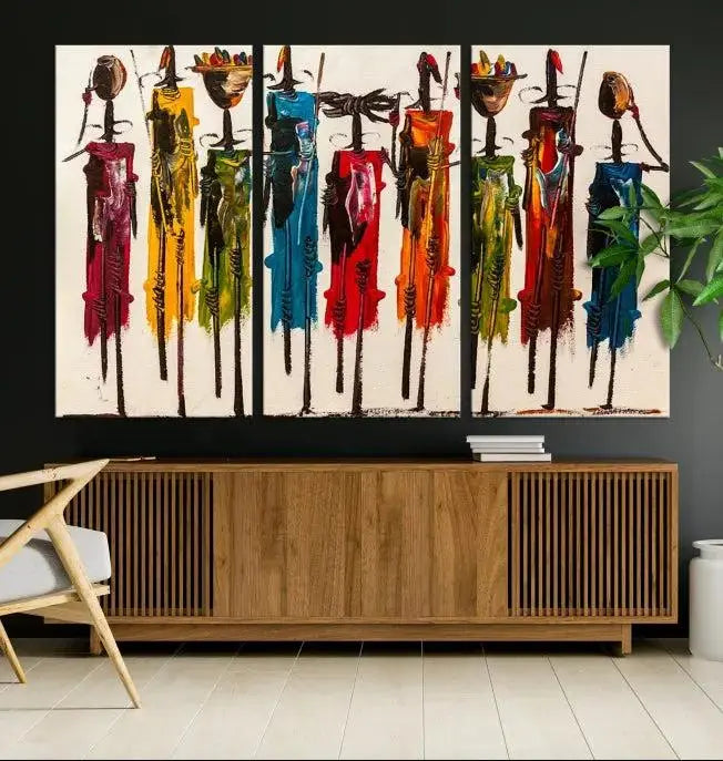 Abstract African Women Wall Art Canvas Print featuring tall, slender figures is crafted on museum-quality canvases.