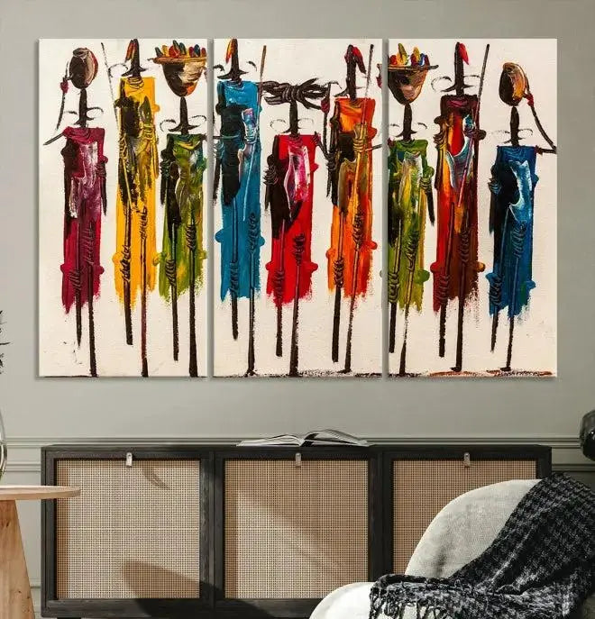 Abstract African Women Wall Art Canvas Print featuring tall, slender figures is crafted on museum-quality canvases.