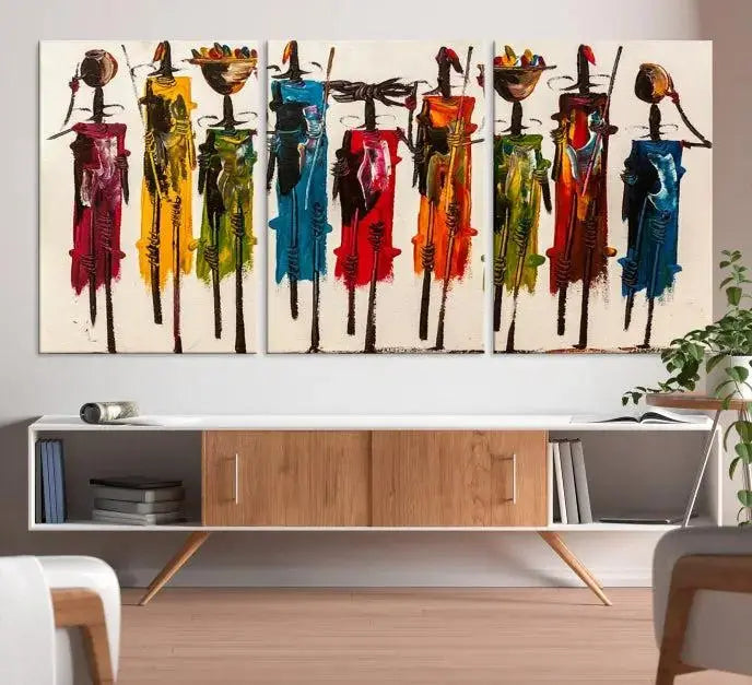 Abstract African Women Wall Art Canvas Print featuring tall, slender figures is crafted on museum-quality canvases.