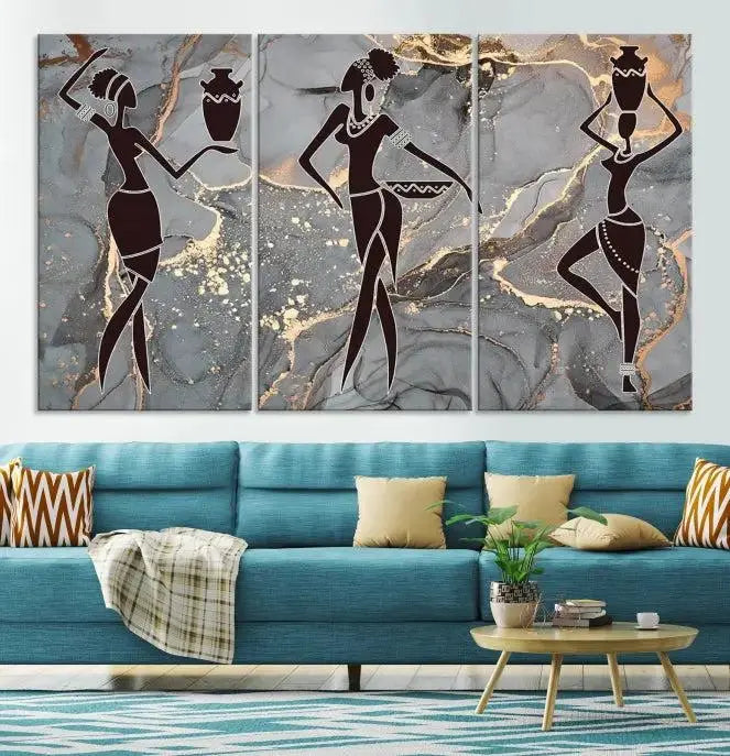 A canvas print titled "Abstract African Womens Art," with UV-protective coating, is displayed in three panels against a dark wall.