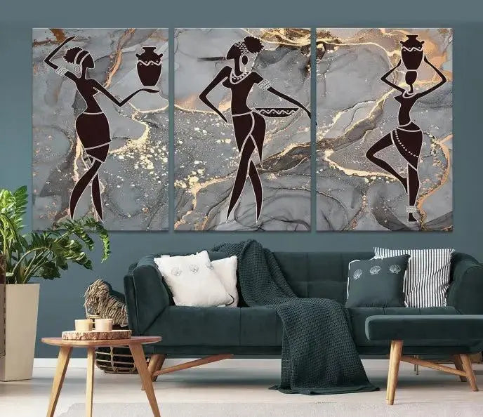 A canvas print titled "Abstract African Womens Art," with UV-protective coating, is displayed in three panels against a dark wall.