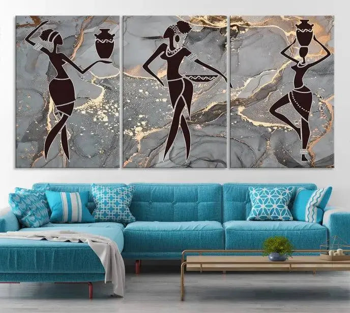 A canvas print titled "Abstract African Womens Art," with UV-protective coating, is displayed in three panels against a dark wall.