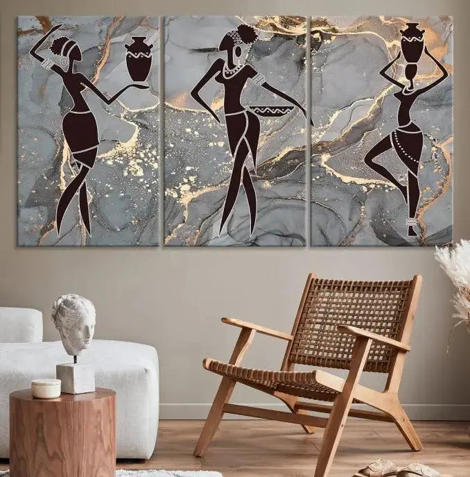 A canvas print titled "Abstract African Womens Art," with UV-protective coating, is displayed in three panels against a dark wall.