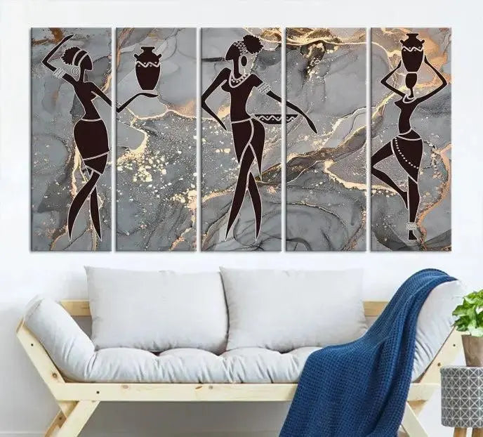 A canvas print titled "Abstract African Womens Art," with UV-protective coating, is displayed in three panels against a dark wall.