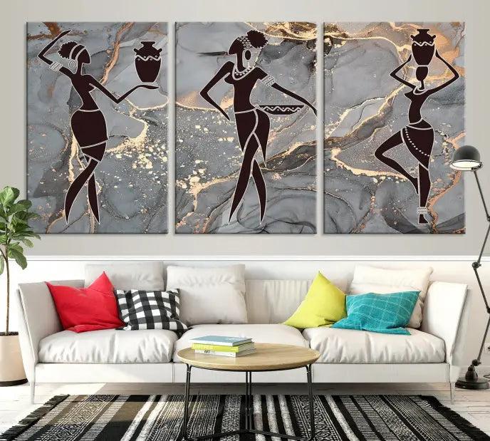 A canvas print titled "Abstract African Womens Art," with UV-protective coating, is displayed in three panels against a dark wall.