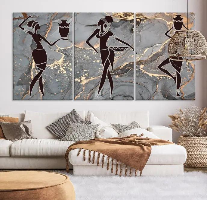 A canvas print titled "Abstract African Womens Art," with UV-protective coating, is displayed in three panels against a dark wall.