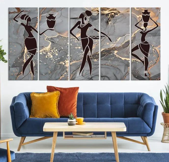 A canvas print titled "Abstract African Womens Art," with UV-protective coating, is displayed in three panels against a dark wall.