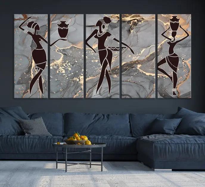 A canvas print titled "Abstract African Womens Art," with UV-protective coating, is displayed in three panels against a dark wall.