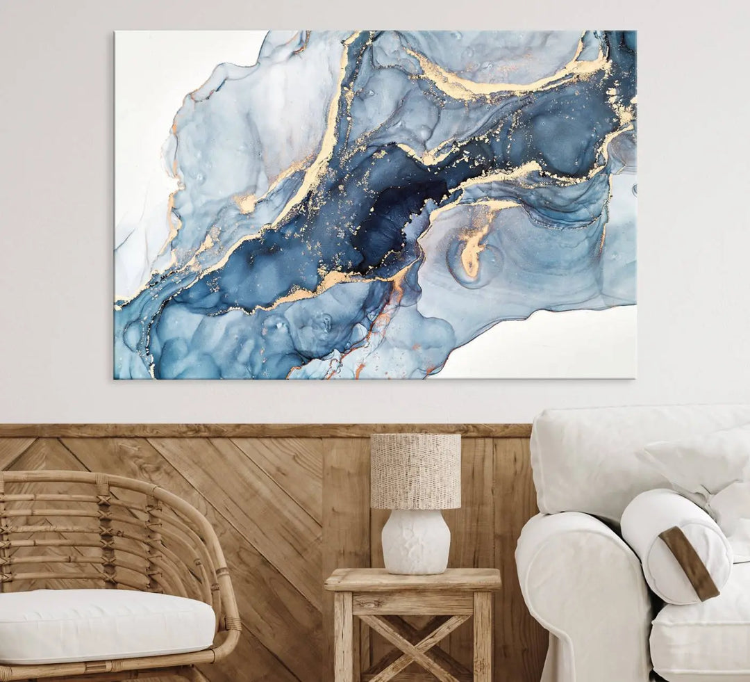 A contemporary setting showcases the "Abstract Art Print - Blue Abstract Canvas Wall Art Print Abstract Art Fluid Effect Marble Wall Art" on a dark wall.