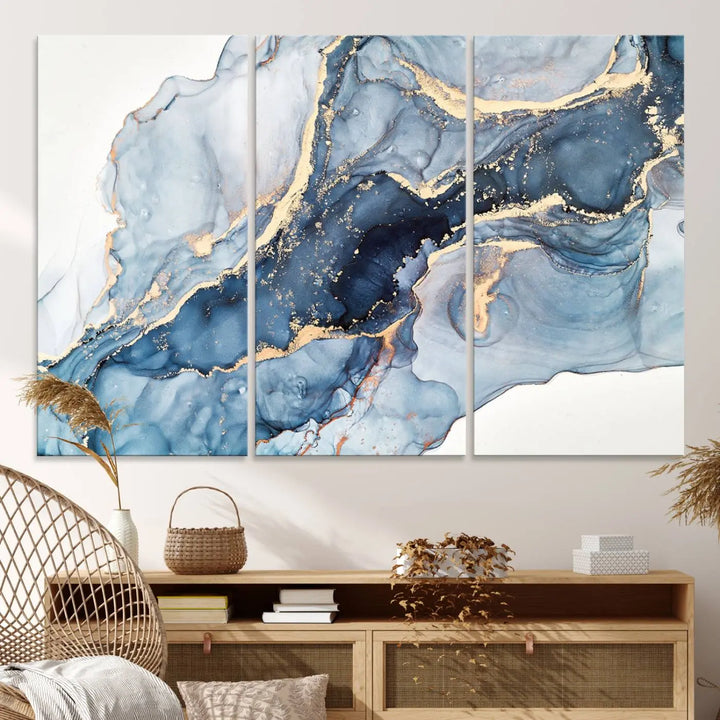 A contemporary setting showcases the "Abstract Art Print - Blue Abstract Canvas Wall Art Print Abstract Art Fluid Effect Marble Wall Art" on a dark wall.