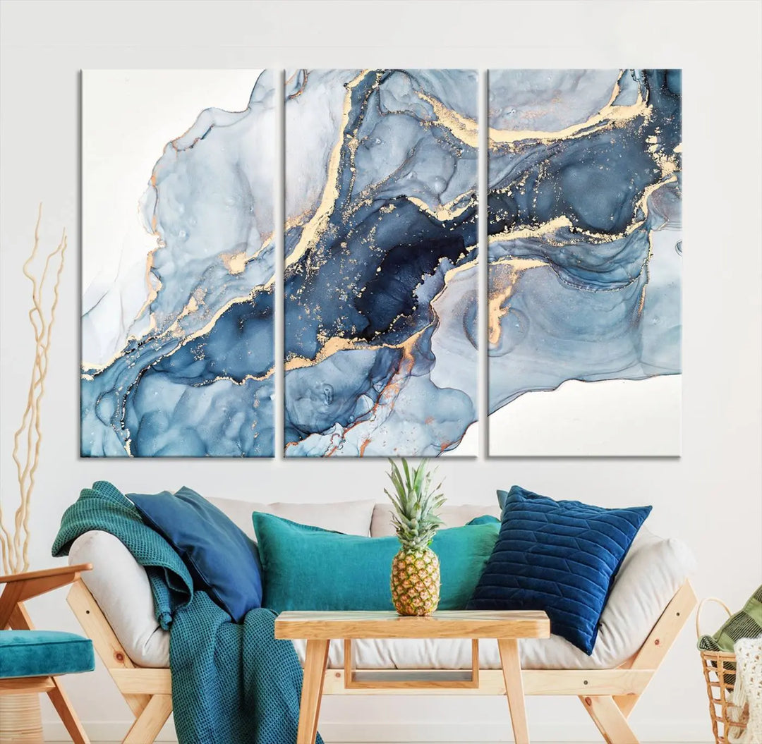 A contemporary setting showcases the "Abstract Art Print - Blue Abstract Canvas Wall Art Print Abstract Art Fluid Effect Marble Wall Art" on a dark wall.