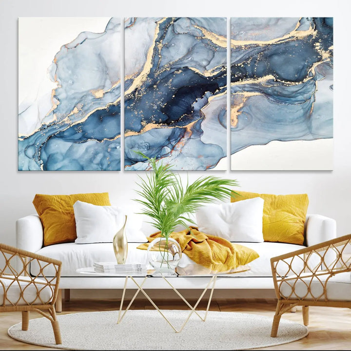 A contemporary setting showcases the "Abstract Art Print - Blue Abstract Canvas Wall Art Print Abstract Art Fluid Effect Marble Wall Art" on a dark wall.