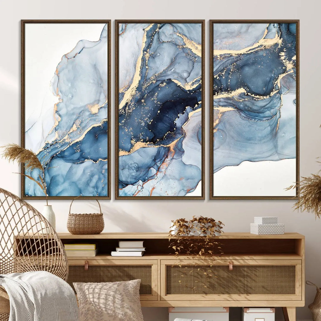 A contemporary setting showcases the "Abstract Art Print - Blue Abstract Canvas Wall Art Print Abstract Art Fluid Effect Marble Wall Art" on a dark wall.