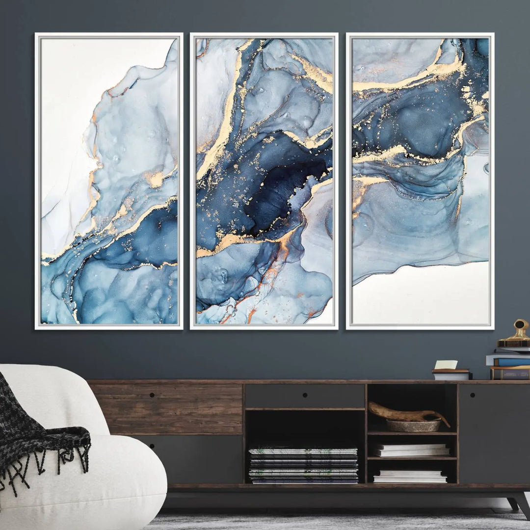 A contemporary setting showcases the "Abstract Art Print - Blue Abstract Canvas Wall Art Print Abstract Art Fluid Effect Marble Wall Art" on a dark wall.