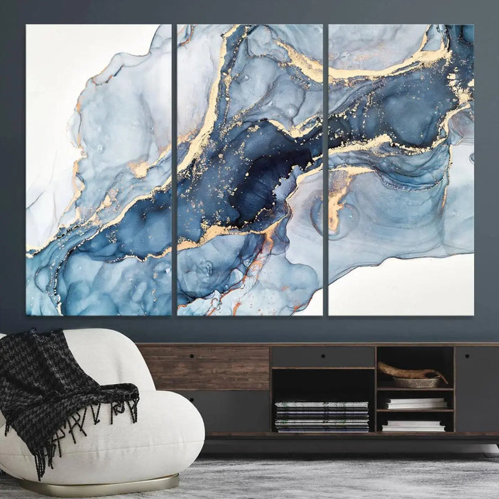 A contemporary setting showcases the "Abstract Art Print - Blue Abstract Canvas Wall Art Print Abstract Art Fluid Effect Marble Wall Art" on a dark wall.