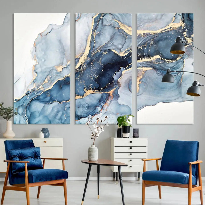 A contemporary setting showcases the "Abstract Art Print - Blue Abstract Canvas Wall Art Print Abstract Art Fluid Effect Marble Wall Art" on a dark wall.