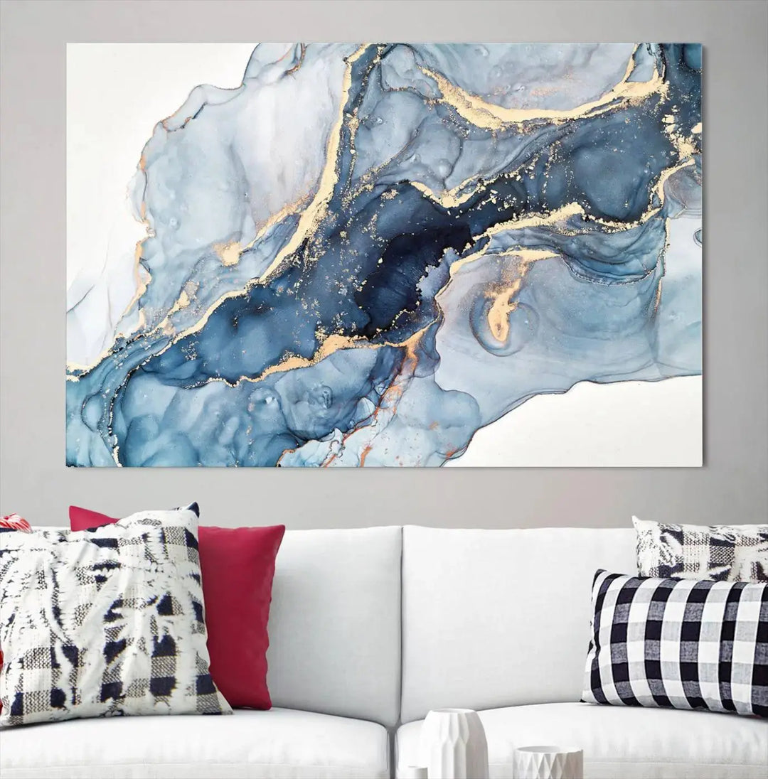 A contemporary setting showcases the "Abstract Art Print - Blue Abstract Canvas Wall Art Print Abstract Art Fluid Effect Marble Wall Art" on a dark wall.