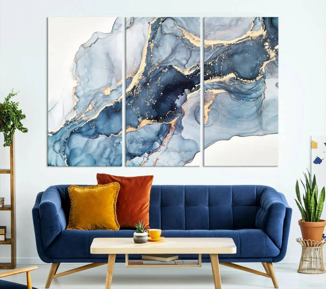 A contemporary setting showcases the "Abstract Art Print - Blue Abstract Canvas Wall Art Print Abstract Art Fluid Effect Marble Wall Art" on a dark wall.