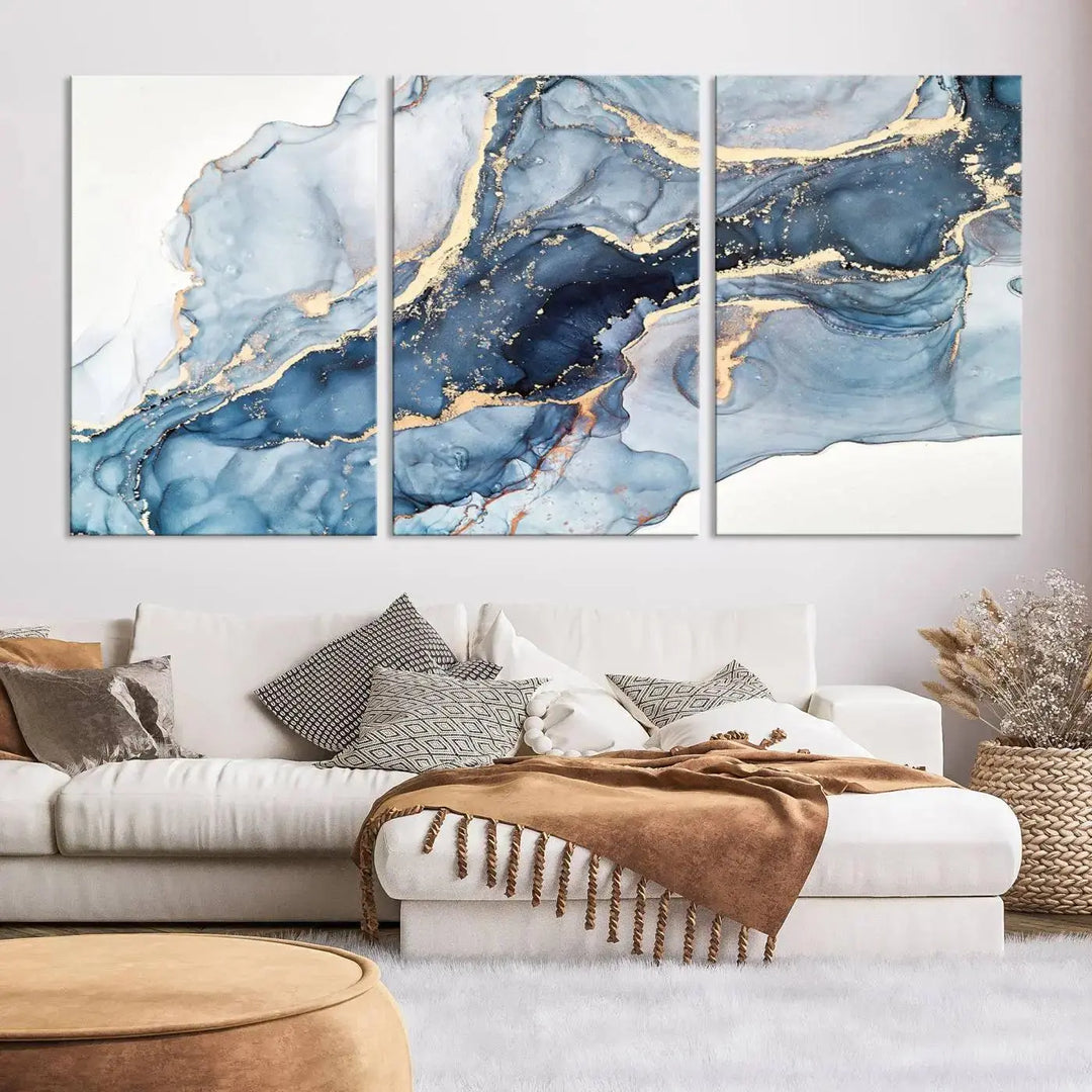 A contemporary setting showcases the "Abstract Art Print - Blue Abstract Canvas Wall Art Print Abstract Art Fluid Effect Marble Wall Art" on a dark wall.