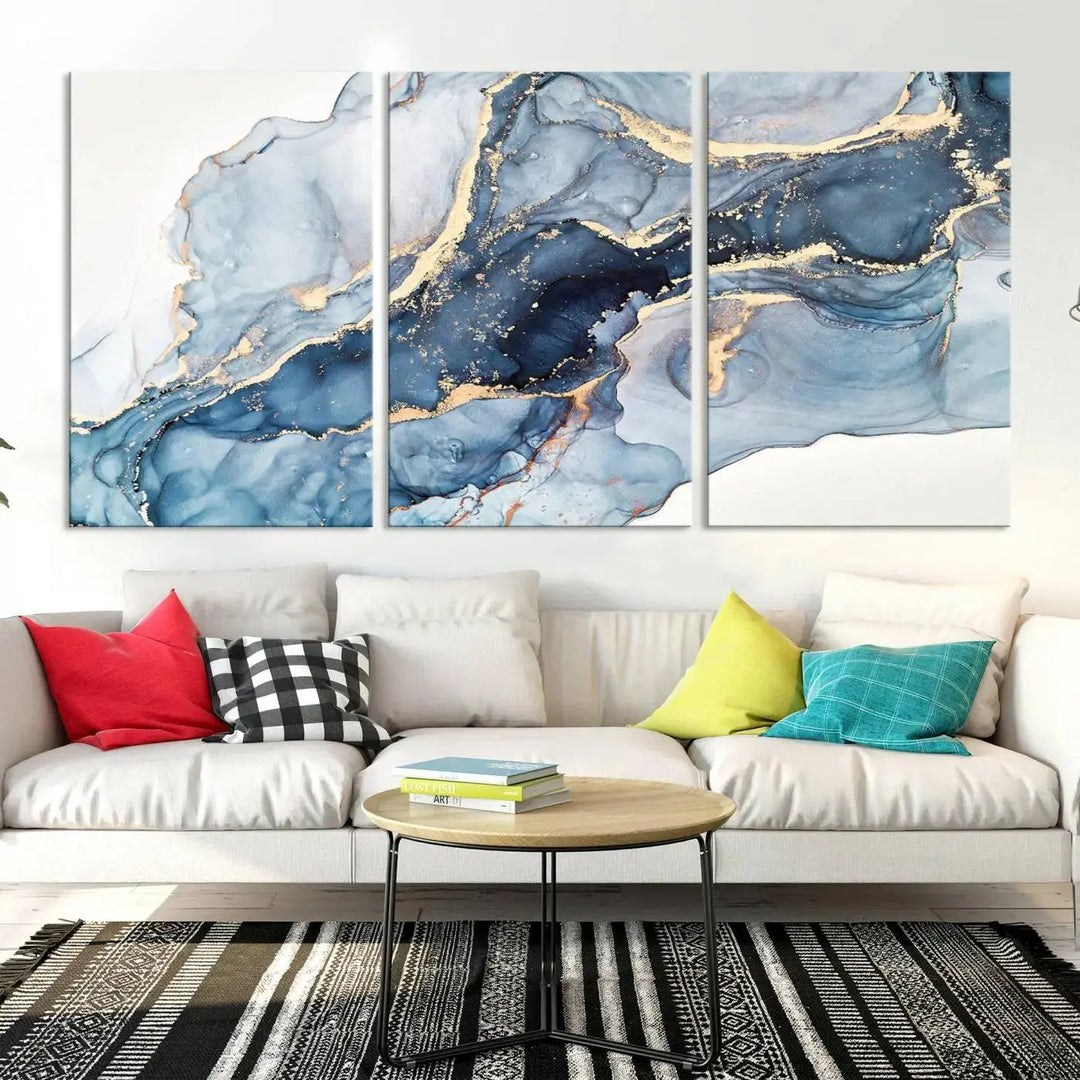 A contemporary setting showcases the "Abstract Art Print - Blue Abstract Canvas Wall Art Print Abstract Art Fluid Effect Marble Wall Art" on a dark wall.