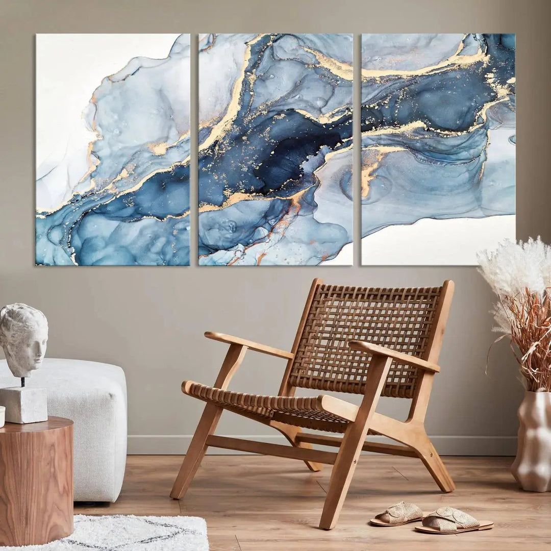 A contemporary setting showcases the "Abstract Art Print - Blue Abstract Canvas Wall Art Print Abstract Art Fluid Effect Marble Wall Art" on a dark wall.