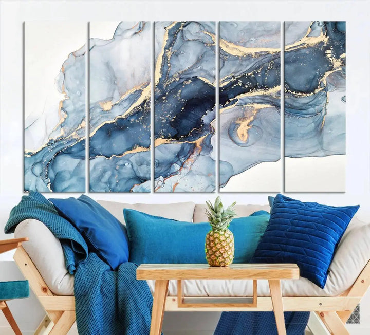 A contemporary setting showcases the "Abstract Art Print - Blue Abstract Canvas Wall Art Print Abstract Art Fluid Effect Marble Wall Art" on a dark wall.