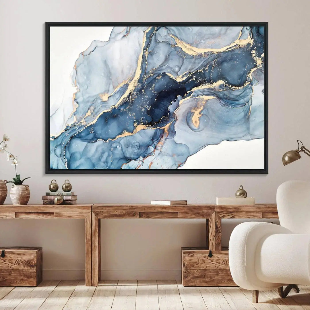 A contemporary setting showcases the "Abstract Art Print - Blue Abstract Canvas Wall Art Print Abstract Art Fluid Effect Marble Wall Art" on a dark wall.