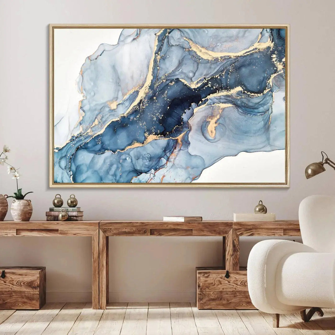 A contemporary setting showcases the "Abstract Art Print - Blue Abstract Canvas Wall Art Print Abstract Art Fluid Effect Marble Wall Art" on a dark wall.